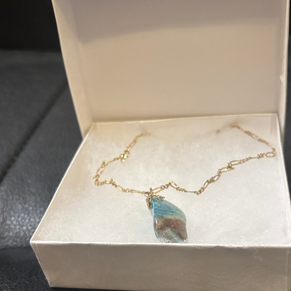 Elegant Gold Necklace with Blue Pendant